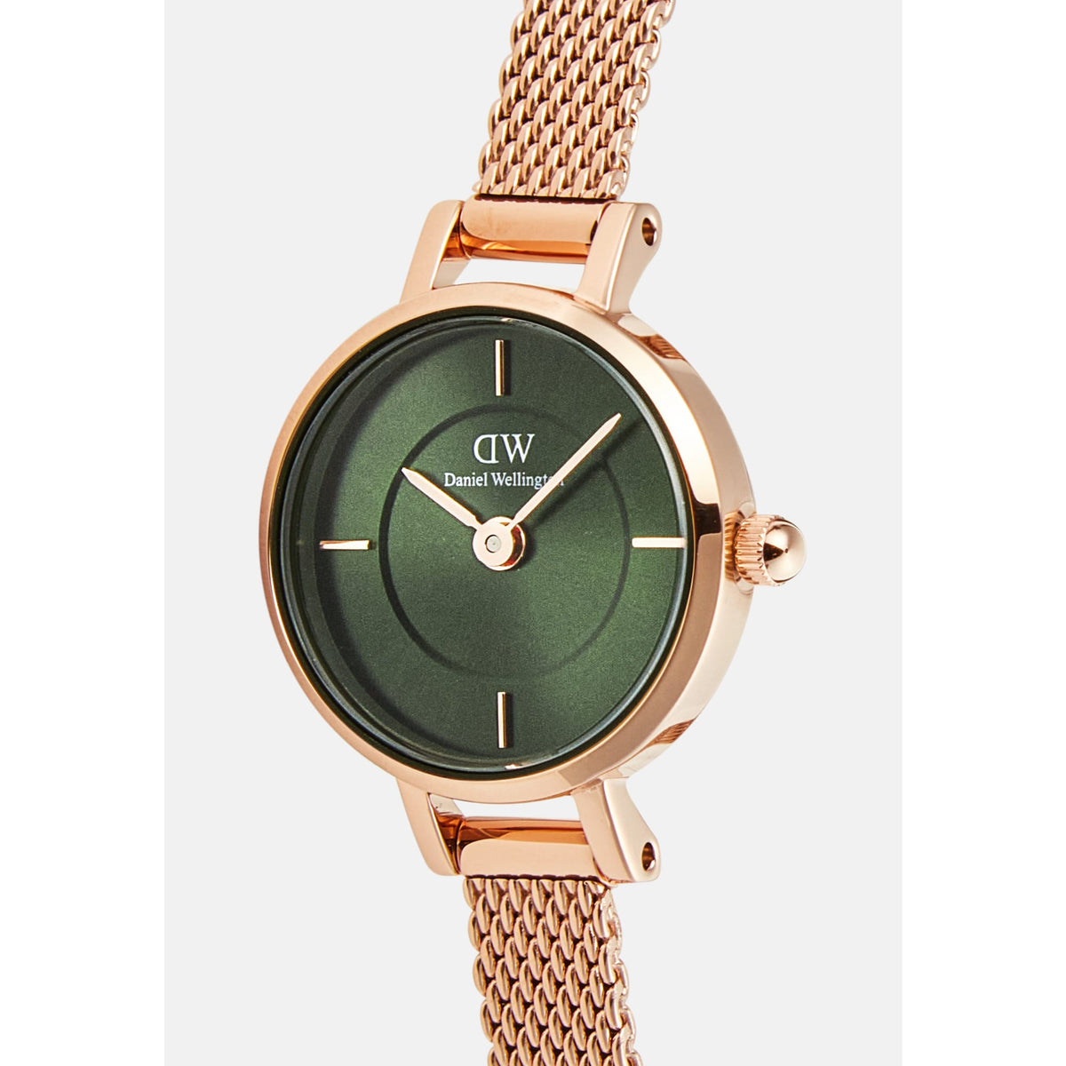Close-up of the Petite Mini Emerald Melrose watch, showcasing its emerald green sunray dial with minimalist markers and a polished rose gold mesh strap, designed for a refined and elegant look.