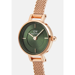 Close-up of the Petite Mini Emerald Melrose watch, showcasing its emerald green sunray dial with minimalist markers and a polished rose gold mesh strap, designed for a refined and elegant look.