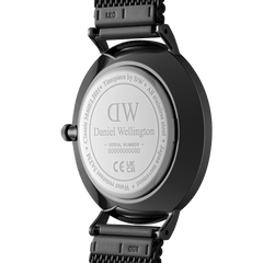 Caseback of the Classic Multi-Eye Ashfield Onyx watch showing Daniel Wellington branding, stainless steel construction, and engraved model details.