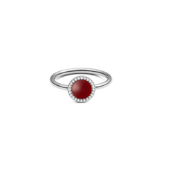 Silver ring with round red agate centre, pavé cubic zirconia halo, slim band; elegant modern jewellery style.
