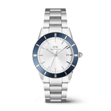Men’s Daniel Wellington Iconic Paradigma Link Blue Bezel watch featuring a polished and brushed stainless steel bracelet, striking blue aluminium bezel, crisp white dial with date display, and minimalist index markings.