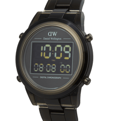 Close-up of the Daniel Wellington Retro Digital Dark Grey watch, showing its round stainless steel case, black digital chronograph display, and sleek dark grey link bracelet.