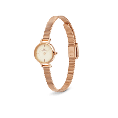 Petite Mini Champagne Melrose watch with a delicate 19mm round champagne dial and slim rose gold mesh strap, shown from a side angle to highlight its elegant, minimalist design.