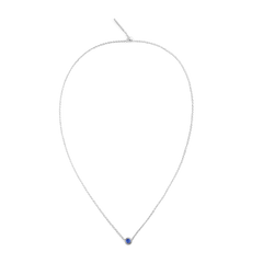 A fine S925 sterling silver necklace featuring a small sapphire-blue September birthstone charm at the centre.