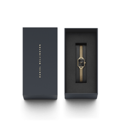 Quadro Mini Evergold Onyx women’s gold mesh watch with black dial, presented in a signature Daniel Wellington gift box.