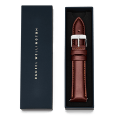 Tapered St Mawes Strap Silver presented in a navy Daniel Wellington gift box, featuring rich brown genuine leather, a polished silver buckle, and refined stitching for a classic, elegant look.