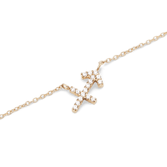 Close-up of the Crystal Zodiac Chain Necklace Gold featuring a Sagittarius pendant adorned with sparkling hand-set crystals on a fine gold-plated chain.