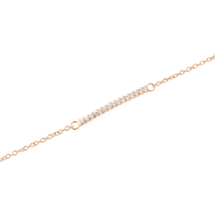 Close-up of the Mirelle Eternity Bracelet Rose Gold, highlighting the slim rose gold chain and the delicate bar set with sparkling white cubic zirconia crystals.