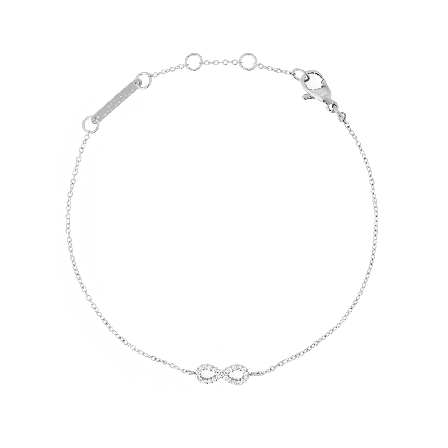 Delicate silver bracelet featuring a slender adjustable chain with a central infinity symbol adorned with white cubic zirconia crystals, crafted from polished stainless steel.