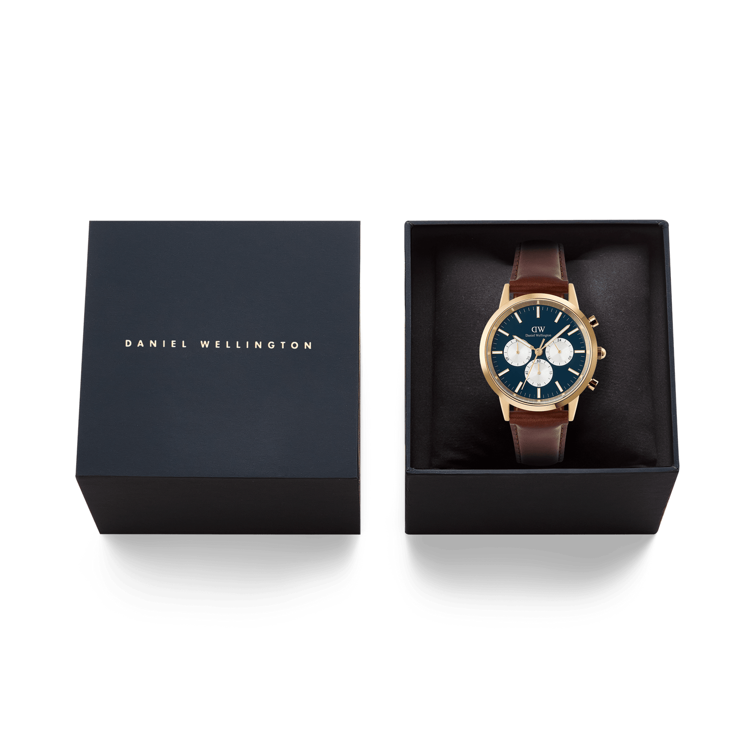 Daniel Wellington Iconic Chronograph St Mawes Arctic Panda Gold watch with a blue dial and brown leather strap, presented in an elegant black gift box with gold branding.