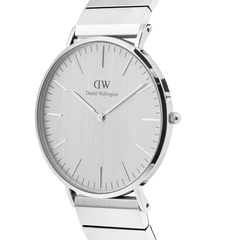 Classic Piano Link Silver Unitone watch featuring a brushed silver minimalist dial, geometric piano link stainless steel strap, and a sleek round case.