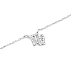 Delicate silver chain necklace featuring a Virgo zodiac pendant adorned with sparkling hand-set crystals.