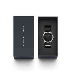 Daniel Wellington Iconic Black NATO Black Dial watch presented in an elegant dark gift box with minimalist branding.