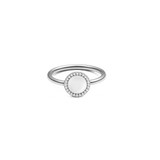 Silver ring with round mother of pearl centre, haloed by white cubic zirconia, minimalist polished band.