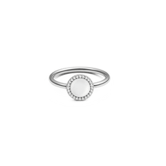 Silver ring with round mother of pearl centre, haloed by white cubic zirconia, minimalist polished band.