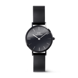 Petite Reflection Black women's watch featuring a polished black mesh strap, minimalist round case, and a distinctive mirror glass dial with silver markers and hands.