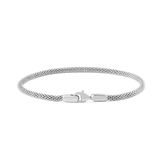 Slim sterling silver mesh bracelet with a polished finish and secure lobster clasp, inspired by classic watch straps.