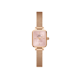Quadro Mini Melrose Blush women’s watch featuring a petite rectangular rose gold case, blush pink sunray dial, minimalist index markers, and a slim rose gold mesh bracelet.
