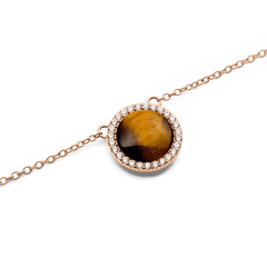 Close-up of Audrey Necklace Tiger Eye Rose Gold featuring a domed Tiger Eye stone framed by sparkling cubic zirconia crystals.