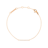 Rose gold chain bracelet featuring a slender adjustable band and a delicate bar set with white cubic zirconia crystals, offering a minimalist and elegant style.