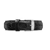 Genuine black croc embossed leather watch strap featuring a polished silver buckle with engraved branding, highlighting its refined texture and classic style.