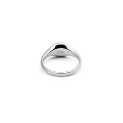 Classic Mini Signet Ring Silver shown from the inside, highlighting the engraved Daniel Wellington logo on the polished 316L stainless steel band.