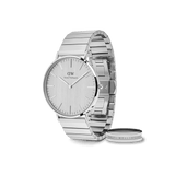 Sleek silver Daniel Wellington watch with a minimalist round dial and brushed steel link strap, paired with a matching engraved silver ring, both featuring a modern classic design.