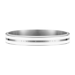 Sleek silver bangle bracelet with a satin white enamel band and subtle Daniel Wellington branding engraved along the edge.