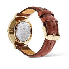 Rear view of the Classic Multi-Eye St Mawes Off-white Sunray Gold watch, highlighting the engraved stainless steel case back, gold pin buckle, and genuine brown leather strap.