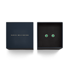 Audrey Earrings Jade Gold presented in an elegant navy Daniel Wellington gift box, featuring round green jade studs framed by sparkling cubic zirconia.