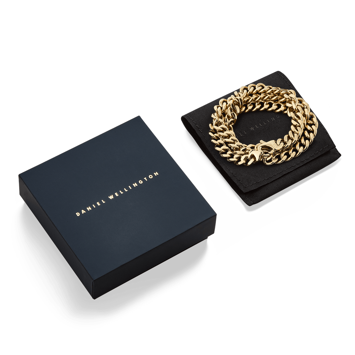 Ellipse Cuban Chain Necklace Gold presented coiled on a black pouch beside a navy Daniel Wellington gift box, showcasing its polished gold links and elegant packaging.