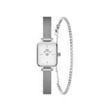 Silver Daniel Wellington Quadro Mini watch with a rectangular white dial and slender mesh strap, paired with an elegant tennis bracelet featuring sparkling crystals.