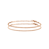 Two rose gold bracelets, one with a textured chain and the other with a smooth, minimalist design, displayed side by side as a coordinated set.