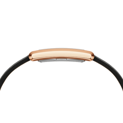 Side profile of the Bound Black Crocodile Rose Gold watch showing its slim curved rose gold case and black leather strap.