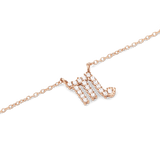 Delicate rose gold chain necklace featuring a Scorpio zodiac pendant adorned with hand-set sparkling crystals.