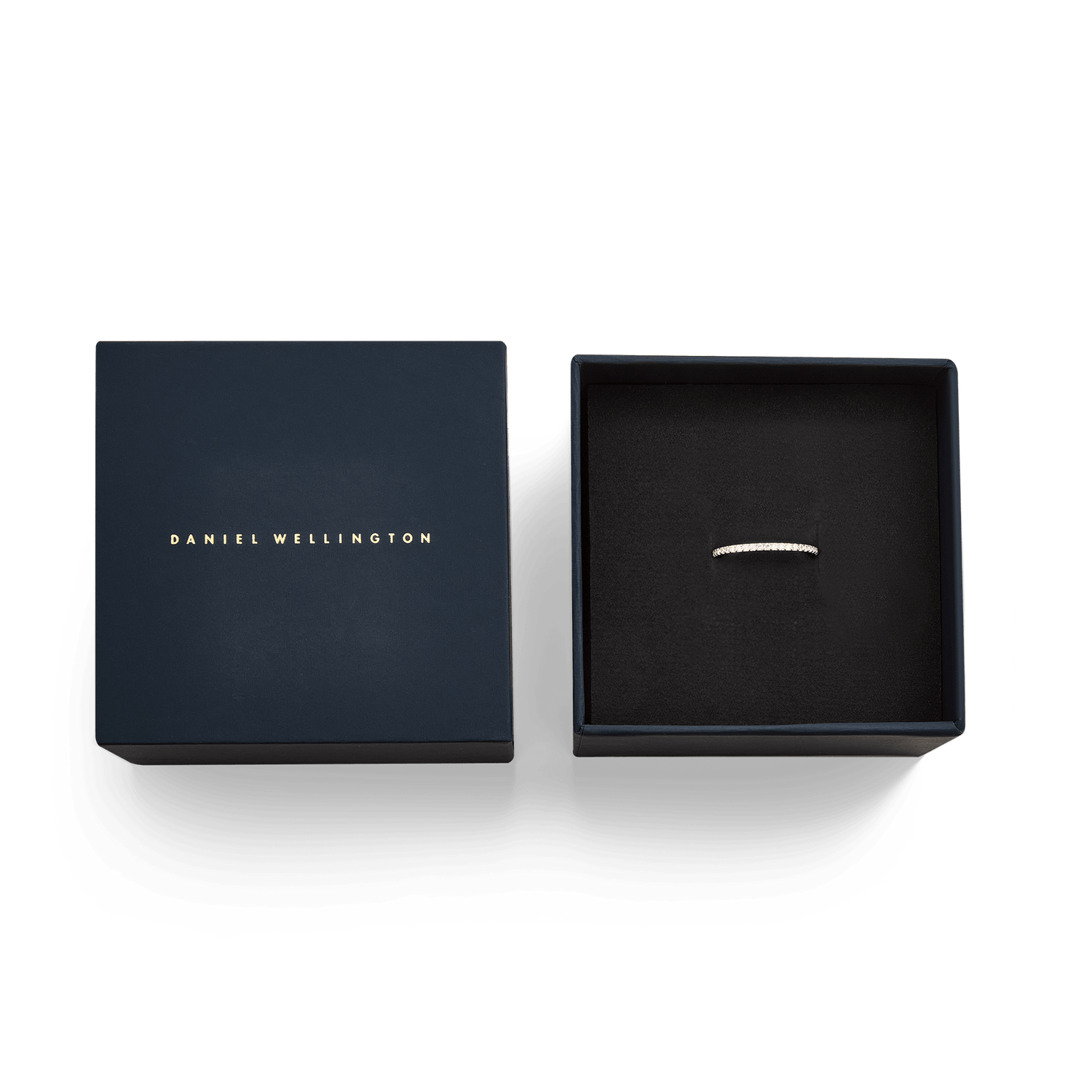 Mirelle Eternity Ring Rose Gold 1.4 mm presented in an elegant navy Daniel Wellington gift box, highlighting its slim rose gold band and sparkling white cubic zirconia crystals.