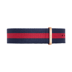 Navy and red striped Oxford Strap Rose Gold nato watch strap with a polished rose gold buckle, crafted from durable polyester for Daniel Wellington watches.