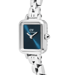 Close-up of the Quadro Mini Arch 3-link Arctic Sunray Silver women’s watch, highlighting its polished rectangular stainless steel case, deep blue sunray dial, and refined three-link bracelet.