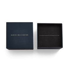 Black Crystal Tennis Bracelet presented in an elegant Daniel Wellington gift box with gold lettering.