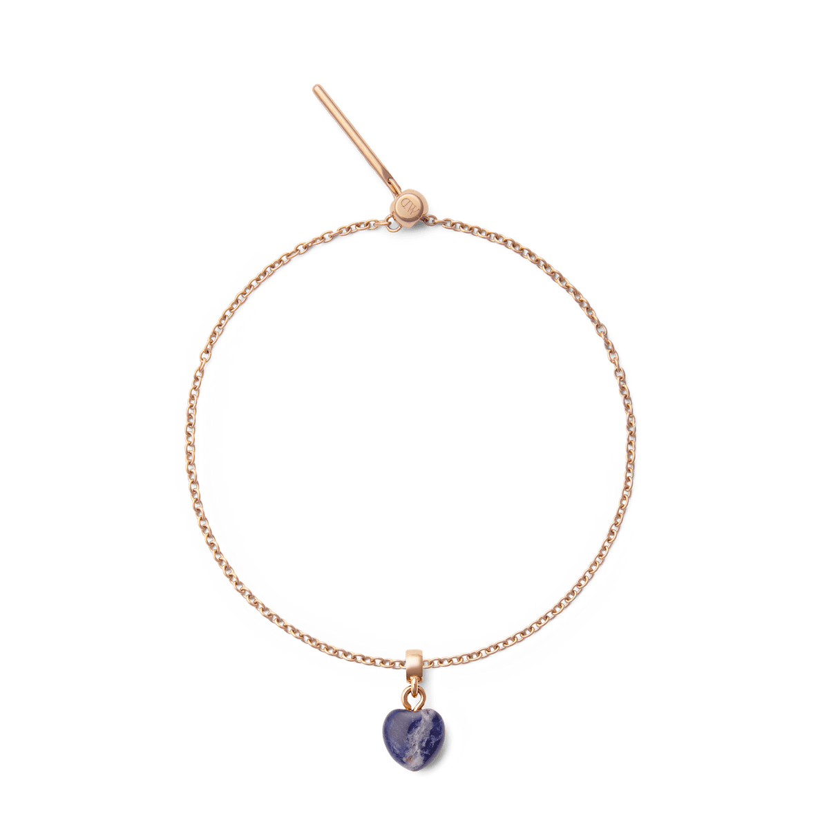 Delicate rose gold bracelet featuring a heart-shaped blue spot stone charm with natural veining, designed for a refined and modern jewellery look.