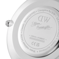 Close-up of the engraved caseback from the Steven Harrington x Daniel Wellington watch, featuring the DW logo, Steven Harrington’s signature, and detailed serial number and model information on stainless steel.