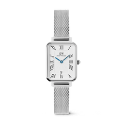 Rectangular silver women’s watch with a white guilloché dial, bold Roman numerals, blue hands, date window at six o’clock, and an adjustable polished mesh strap.