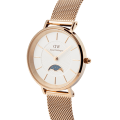 Petite Lune Melrose watch featuring a white textured dial, rose gold case, moon phase sub-dial, and a fine rose gold mesh strap.