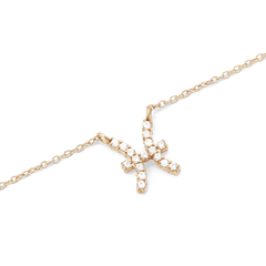 Gold chain necklace featuring a Pisces zodiac pendant adorned with sparkling hand-set crystals.