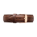 Bristol Strap Rose Gold featuring smooth dark brown leather, detailed stitching, and a polished rose gold buckle engraved with the Daniel Wellington logo, ideal for updating or replacing your watch strap.