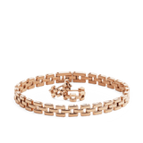 Polished rose gold jewellery set featuring a bold link bracelet and matching chunky link earrings, both crafted with a modern, sophisticated design.