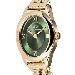 Close-up of the Daniel Wellington Ophelia Mini Emerald Gold watch, highlighting the oval emerald green sunray dial, gold Roman numerals, and polished gold case with a matching link bracelet.