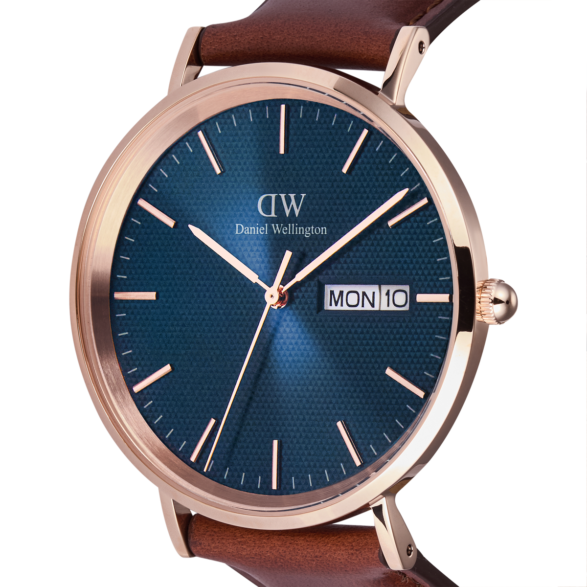 Close-up of the Classic Day Display St Mawes Rose Gold Arctic watch, highlighting the textured blue dial, rose gold case, minimalist hour markers, and the day and date display window.