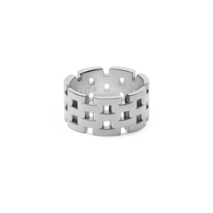 Polished silver ring with a bold five-link design and sculptural gaps, inspired by classic watch straps.