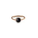 Rose gold ring with round black agate centre, haloed by white cubic zirconia, elegant and modern jewellery for women.
